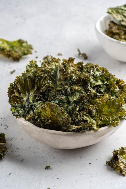 Homemade Organic Green Kale Chips with salt and oil Super food kale leaves