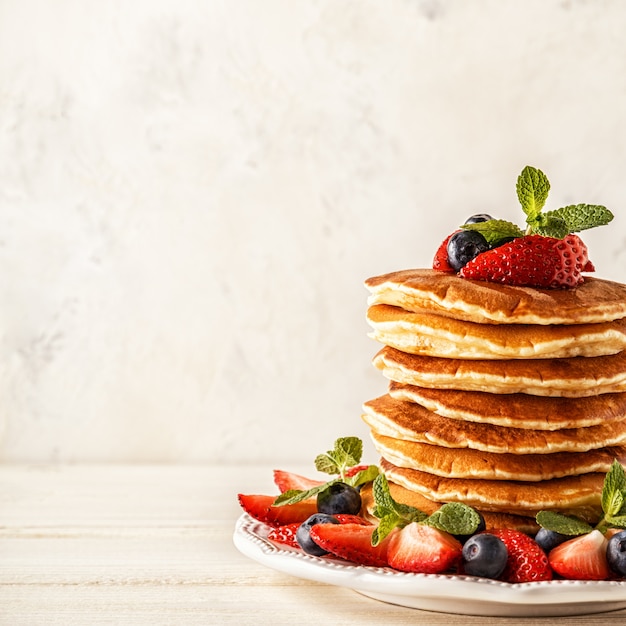 Homemade pancakes with berries and fruit