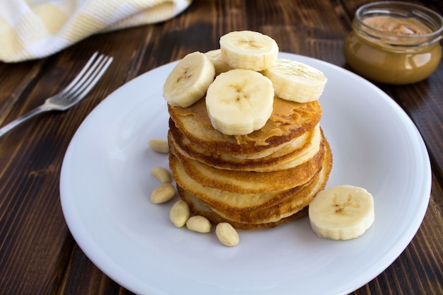 Homemade pancakes with peanut paste and banana