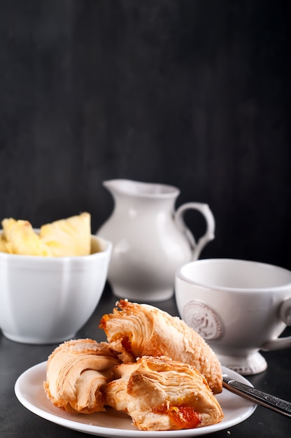 Homemade pastry with orange and Mugs of  Green Tea 