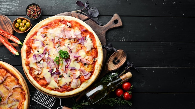 Homemade pizza with mushrooms onions and bacon Top view free space for your text Rustic style