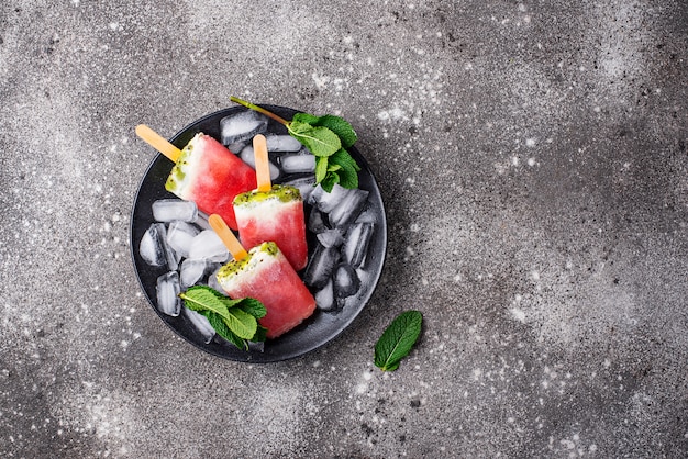 Homemade popsicles in shape of watermelon