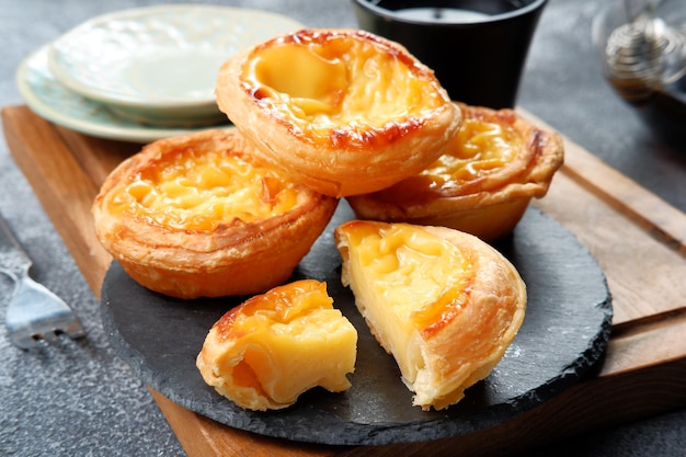 homemade Portuguese Egg Tart or Pastel de nata or pastel de Belm on dark background