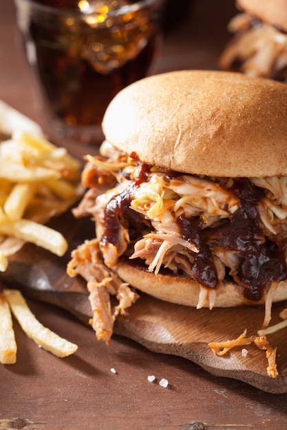 Homemade pulled pork burger with coleslaw and bbq sauce