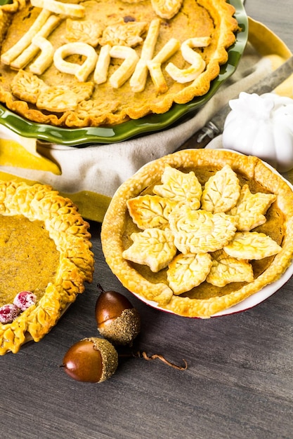 Homemade pumpkin pies with Autumn stamped leafs.