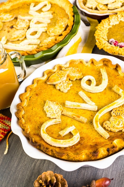 Homemade pumpkin pies with Autumn stamped leafs.