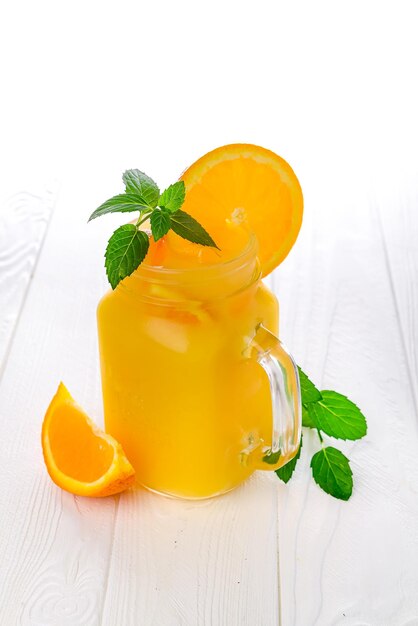 Homemade refreshing iced tea with orange and lemon