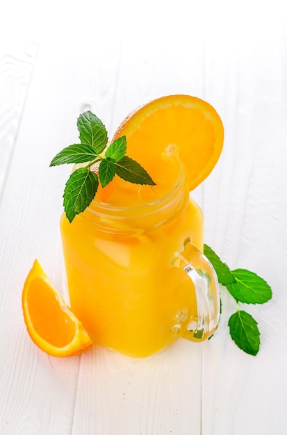 Homemade refreshing iced tea with orange and lemon