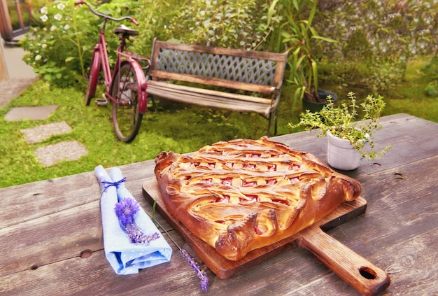 Homemade Russian pie served in the garden