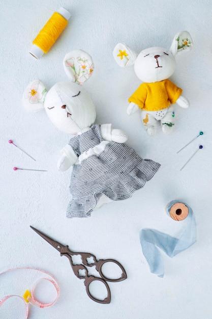 Homemade sewn soft toy mouse with the baby