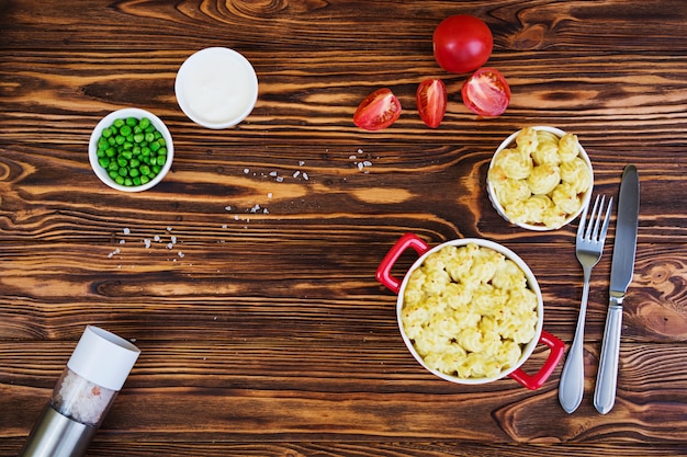 Homemade shepherd's pie on wooden background