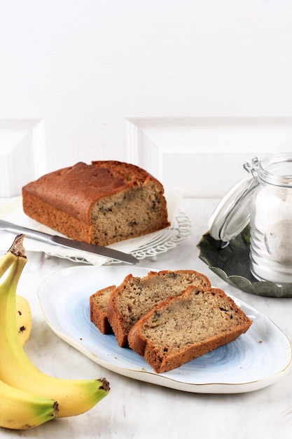 Homemade Sliced Banana Bread on White Background Bakery Concept