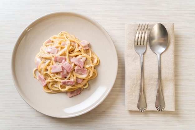 homemade spaghetti white cream sauce with ham - Italian food style