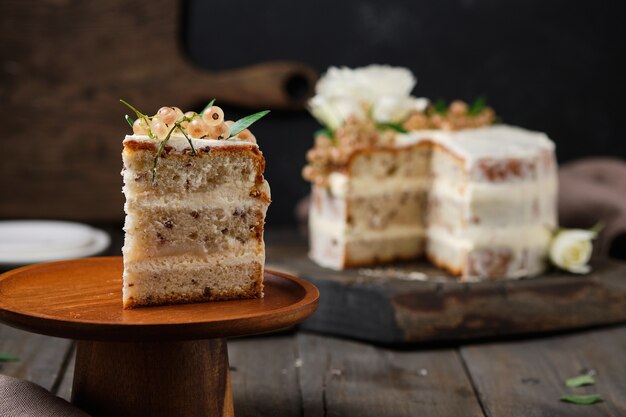 Homemade sponge cake with cream cheese cream and white currant filling