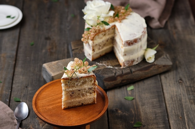 Homemade sponge cake with cream cheese cream and white currant filling