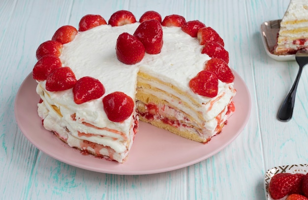 homemade strawberry cake cut Strawberry pie decorated with fresh strawberries stands on a plate