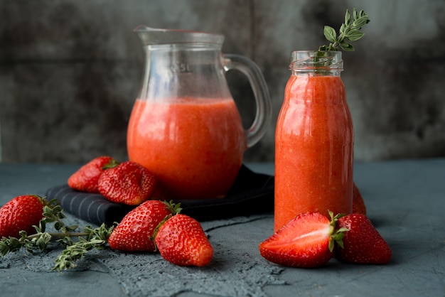 Homemade strawberry smoothie in a bottle