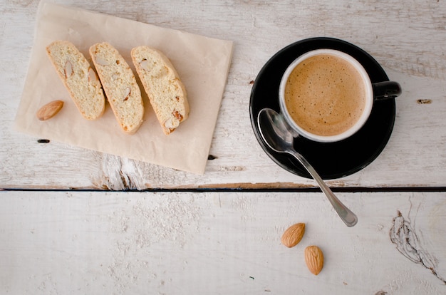 Homemade tasty almond cookies and coffee cup