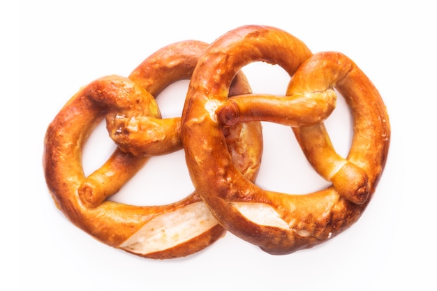 Homemade twisted knot Soft salt Pretzels on white background 