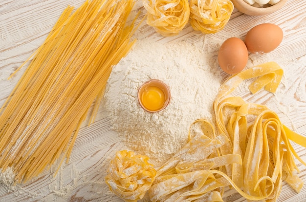 Homemade uncooked pasta with raw egg