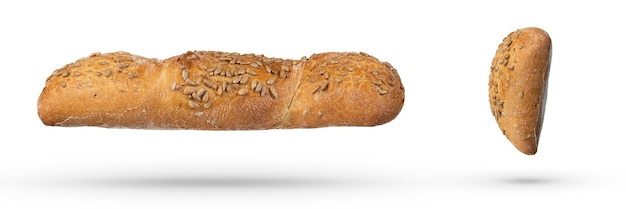 Homemade white bread isolate with seeds and whole grains Side view of a loaf of fresh bread on a white isolated background The concept of baking bread