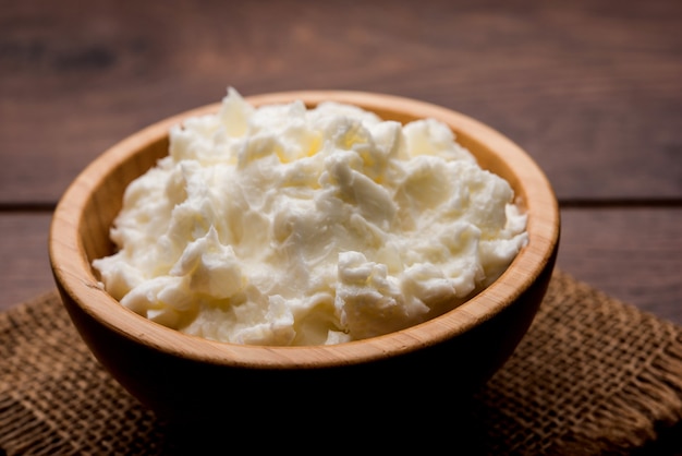 Homemade white Butter or Makhan or Makkhan in Hindi, served in a bowl. selective focus