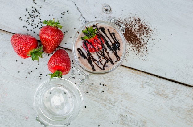 Homemade yogurt in a jar with strawberry