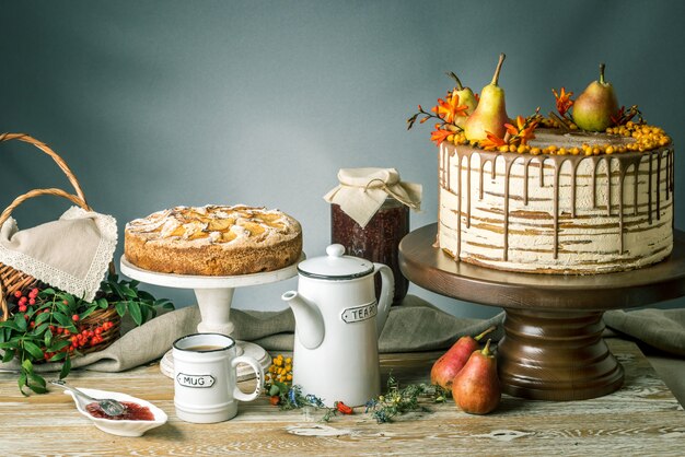 Honey cake poured with chocolate and decorated with pears