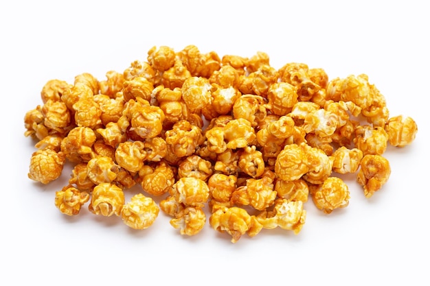 Honey caramel popcorn on white background