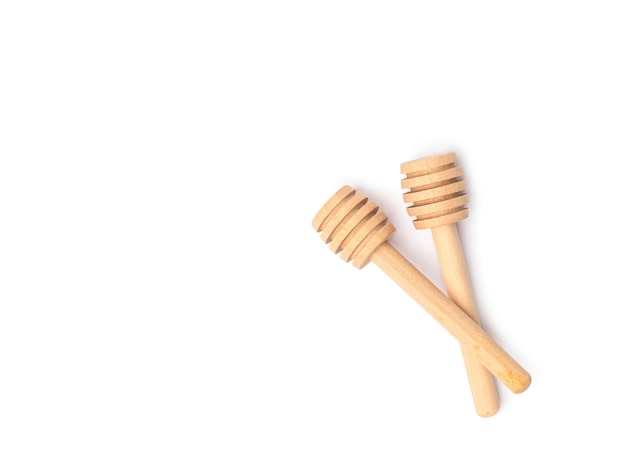 Honey Dipper Sticks on white background