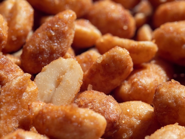 Honey peanuts background and texture Glazed and roasted peanuts Peanut close up