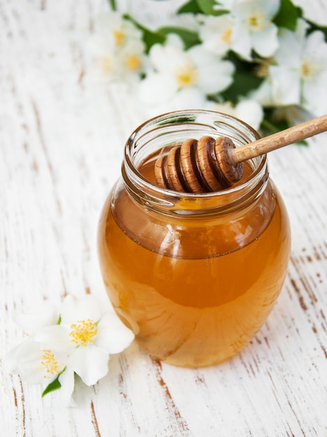 Honey with jasmine flowers