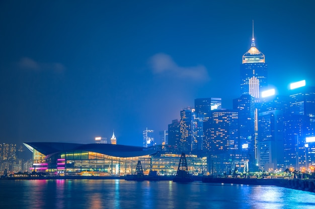 Hong Kong. Embankment, skyscrapers and exhibition center. Cloudy night