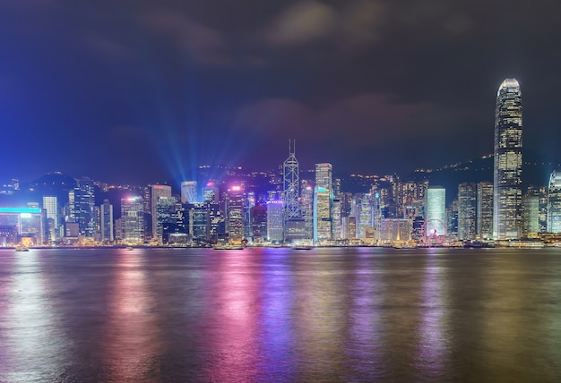 Hong Kong skyline cityscape downtown skyscrapers over Victoria Harbour in the evening. Hong Kong, China