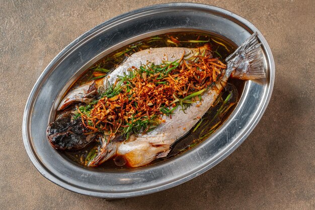 Hong Kong Style Steamed Catfish with ginger scallions and soy sauce