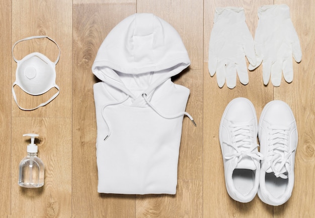 Hoodie with shoes and gloves beside