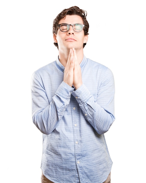 Hopeful young man praying