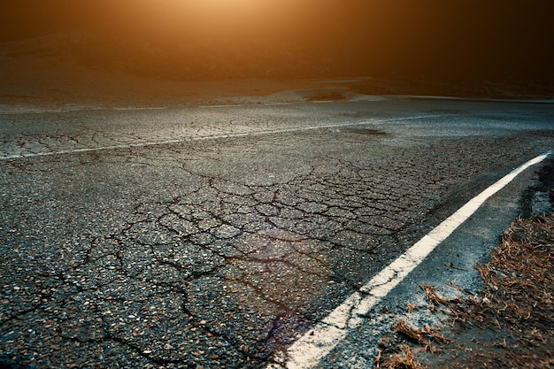 Horizon landscape scenery and sunbeam road.Road travel transportation.Asphalt in perspective.