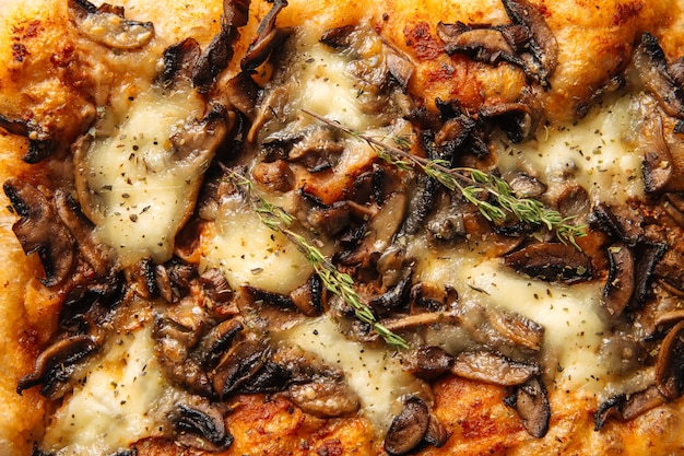 Horizontal closeup baked italian focaccia bread with mushroom texture