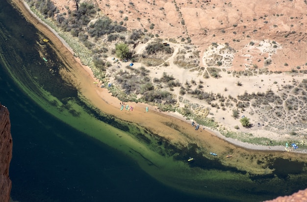 Horseshoe Bend Colorado River and boats near Page Arizona USA