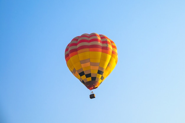 Hot air balloons flying in blue sky