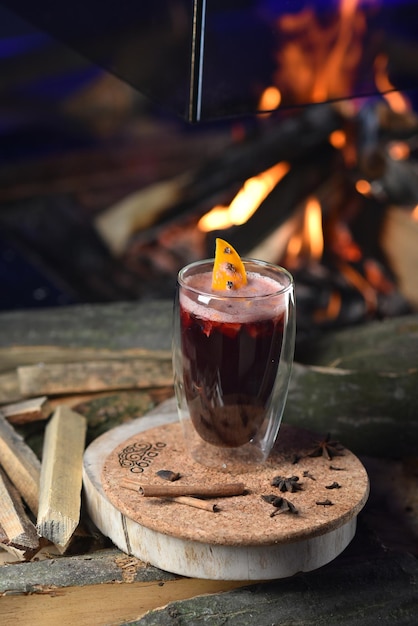 Hot alcoholic drink Glintwine based on red wine with spices in a glass. Wine with spices, hot wine