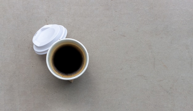 Hot americano on cement table 