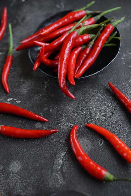 Hot chili pepper, Red pepper closeup on a dark background, Selective focus