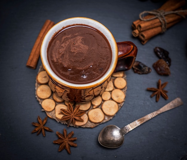 Hot chocolate in a brown mug 