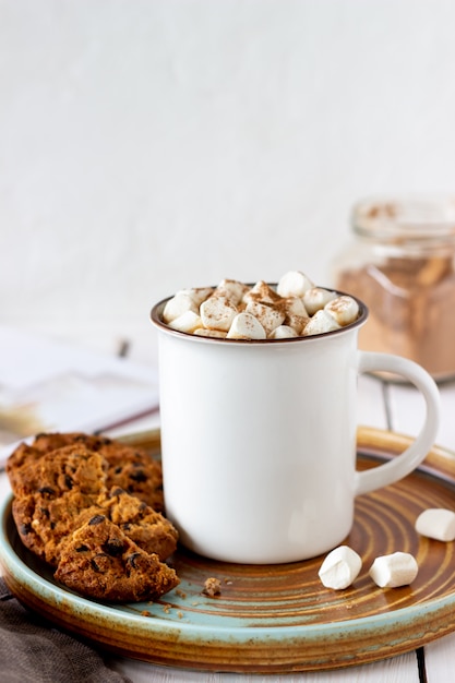 Hot chocolate with marshmallows in a white mug