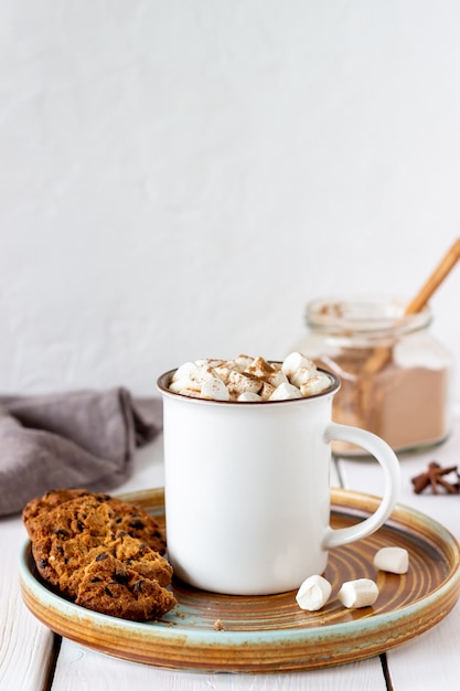 Hot chocolate with marshmallows in a white mug