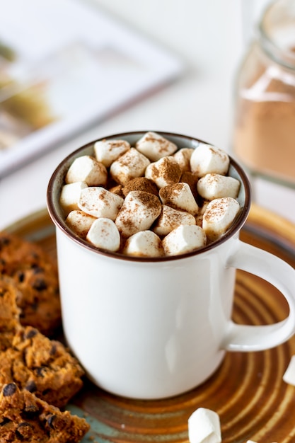 Hot chocolate with marshmallows in a white mug