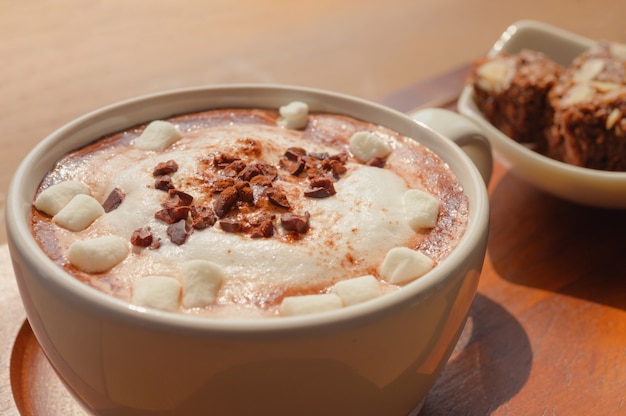 Hot chocolate with marsmallow candies and  Homemade chocolate brownies