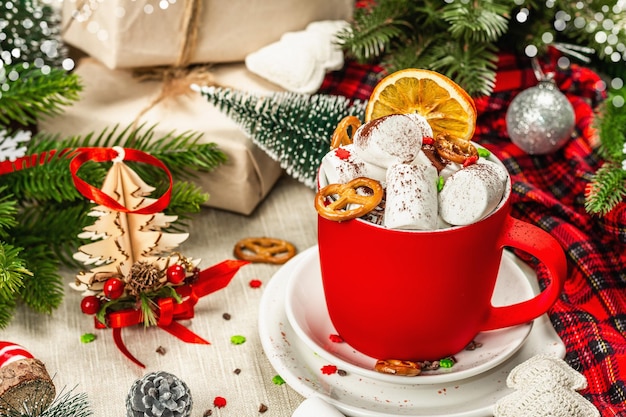 Hot cocoa or chocolate with marshmallows. Christmas traditional decor, New Year festive arrangement. The concept of coziness and good mood, copy space